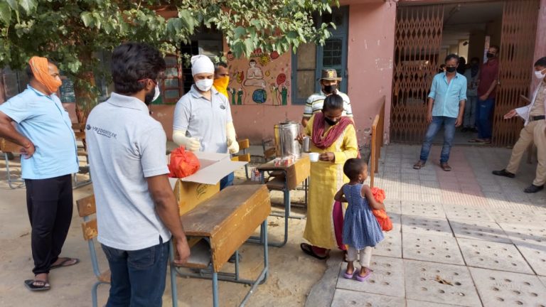 Distributing Food and Face Masks